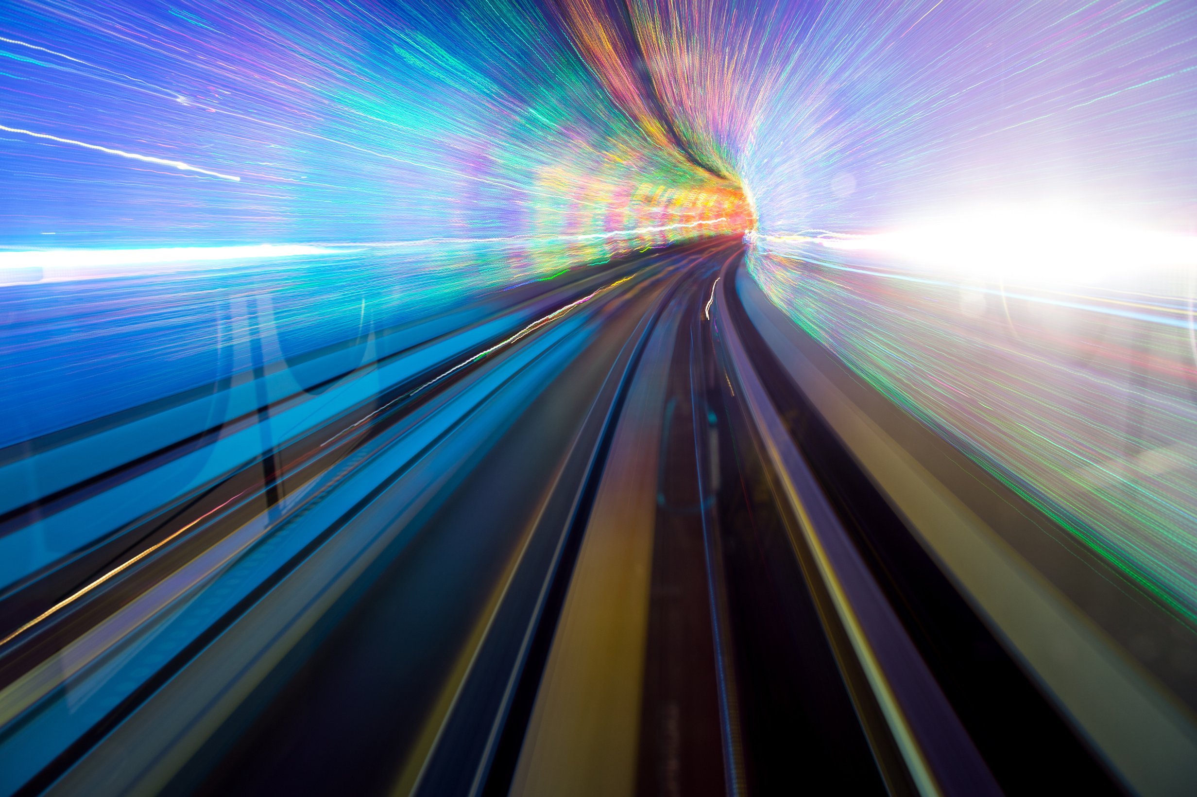 Long exposure photo from the a train going through a tunnel